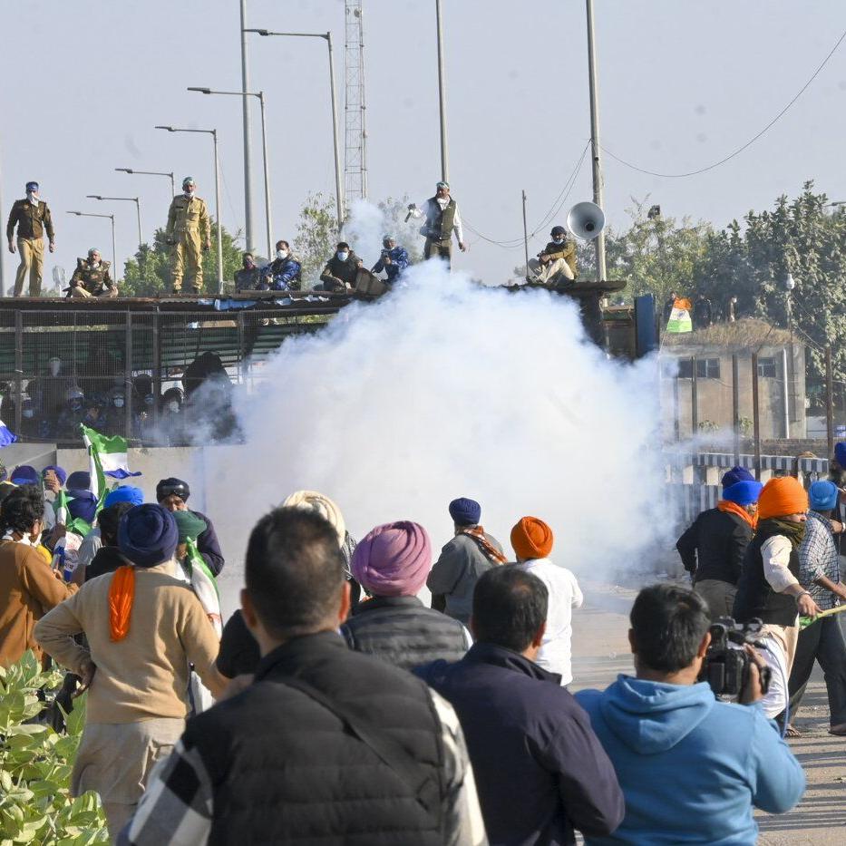 Police in India clash with farmers during protest march over minimum price demand for crops